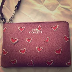 Pink coach wristlet